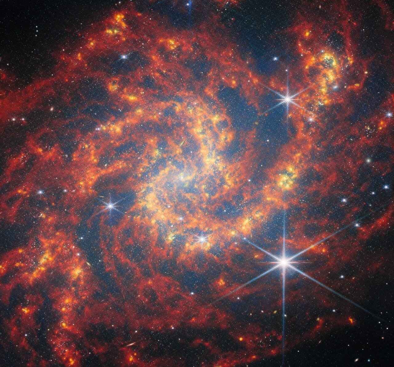 Webb rivela meravigliosi processi di formazione stellare nella galassia NGC 2283