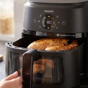 Questa friggitrice ad aria Philips ha una finestrella illuminata e 13 programmi: